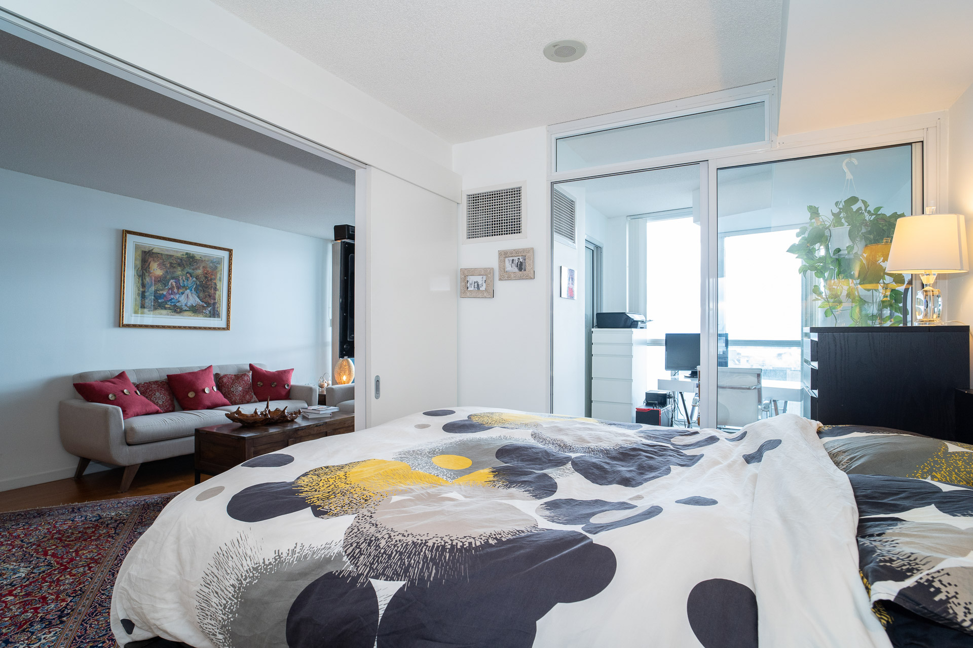 Bedroom with sliding glass partition